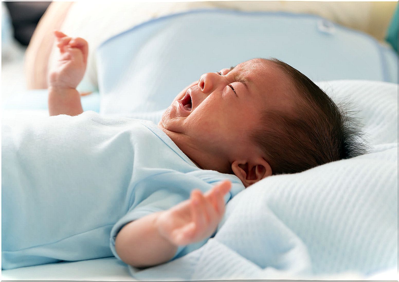 Baby crying in the crib, but one of the myths about raising babies is not going to cry.