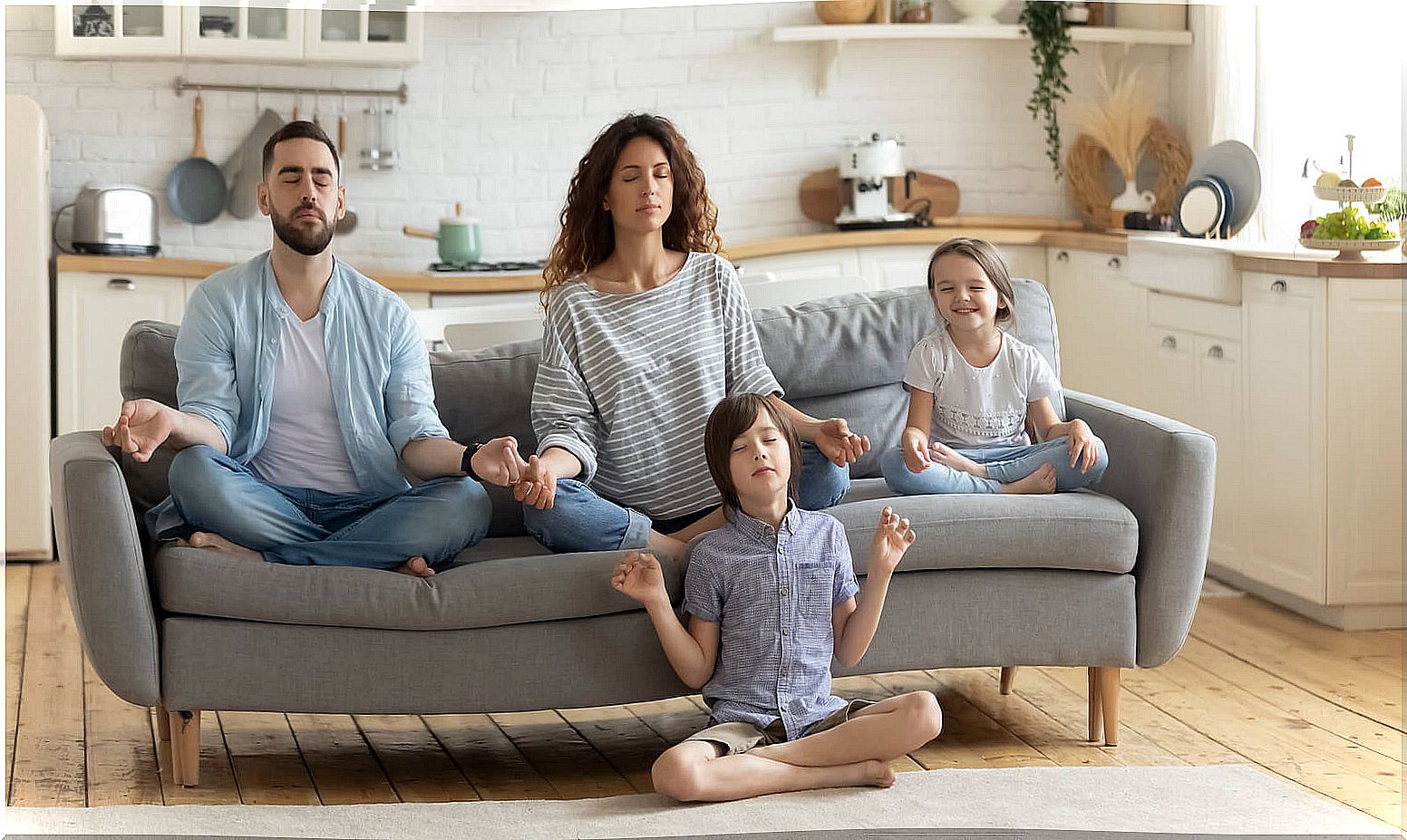 Family practicing meditation.