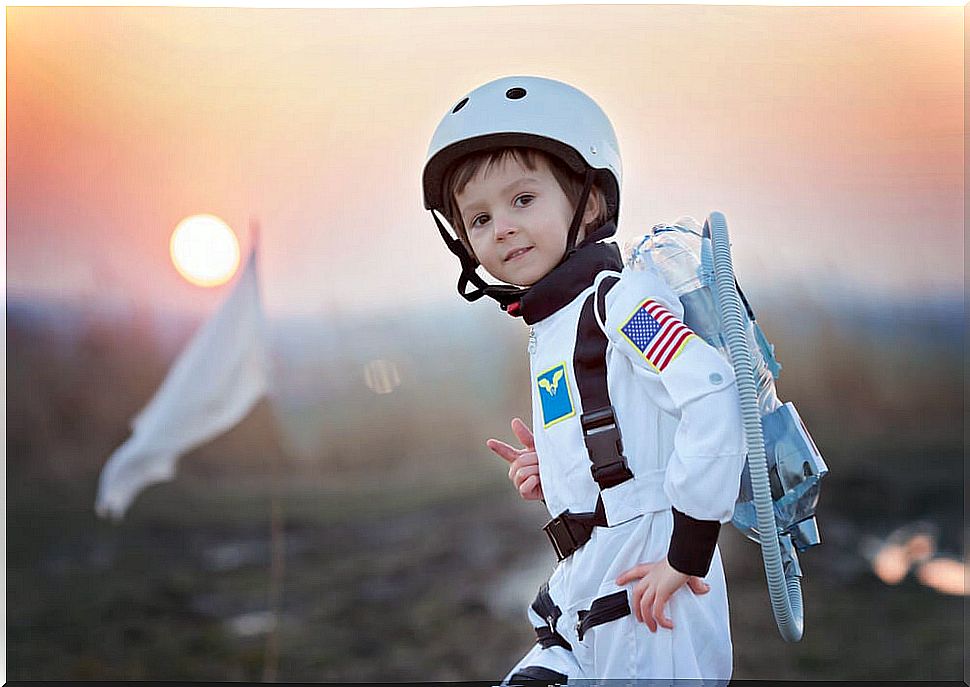 Boy in astronaut costume.