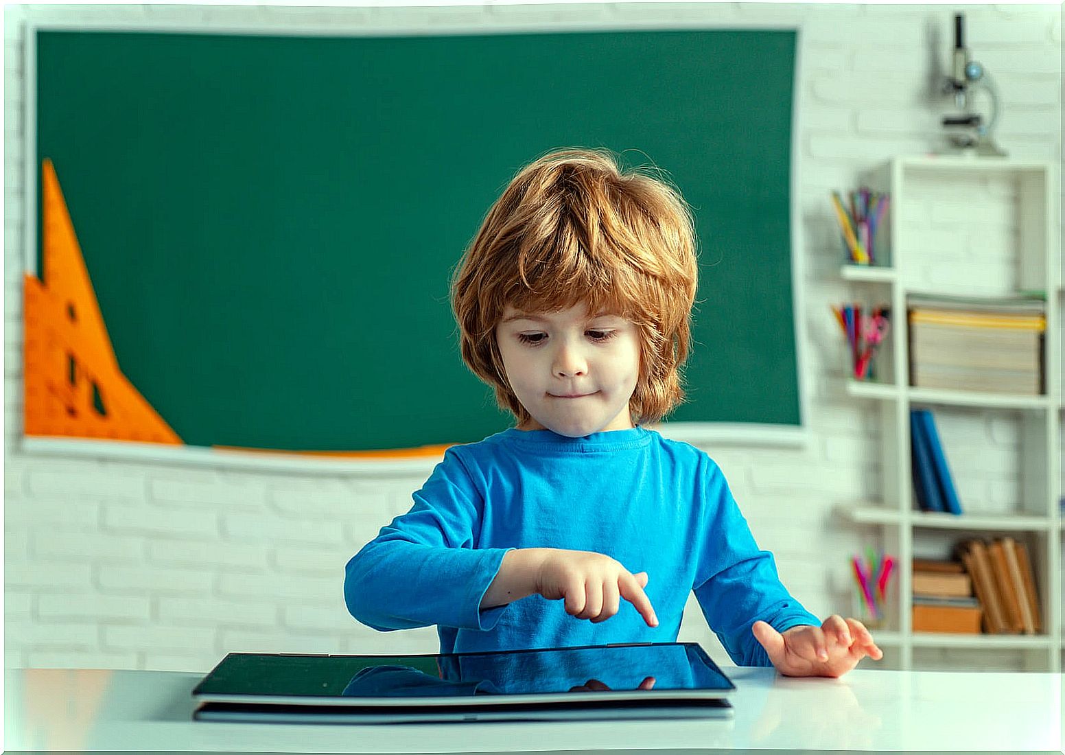 Child in Infant class developing computational thinking.