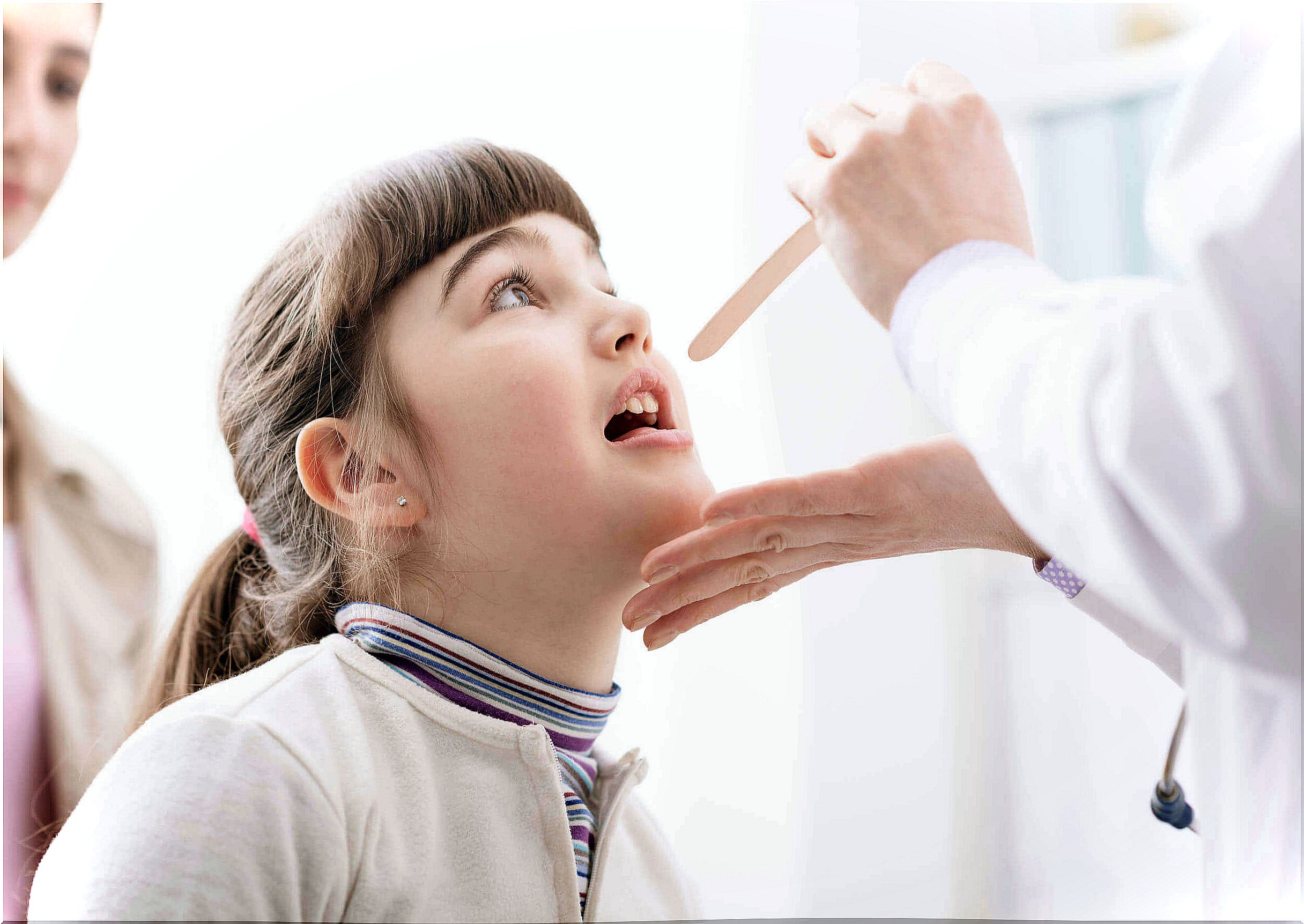 Girl at the pediatrician because her lymph nodes are swollen.