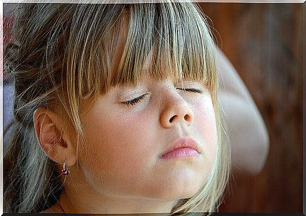 Girl applying the Koeppen technique to learn to relax.